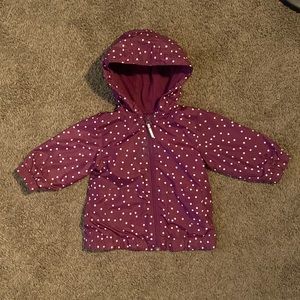 12M purple windbreaker.